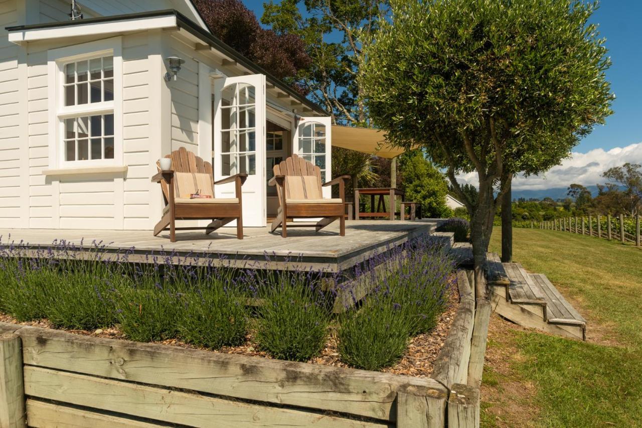 Kina Beach Cottages Tasman Exterior photo